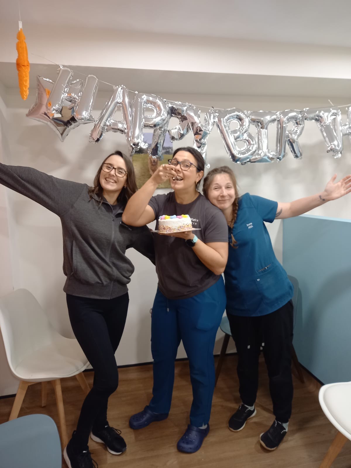 Three ladies celebrating.